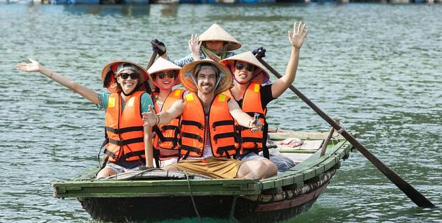 Row boat through village